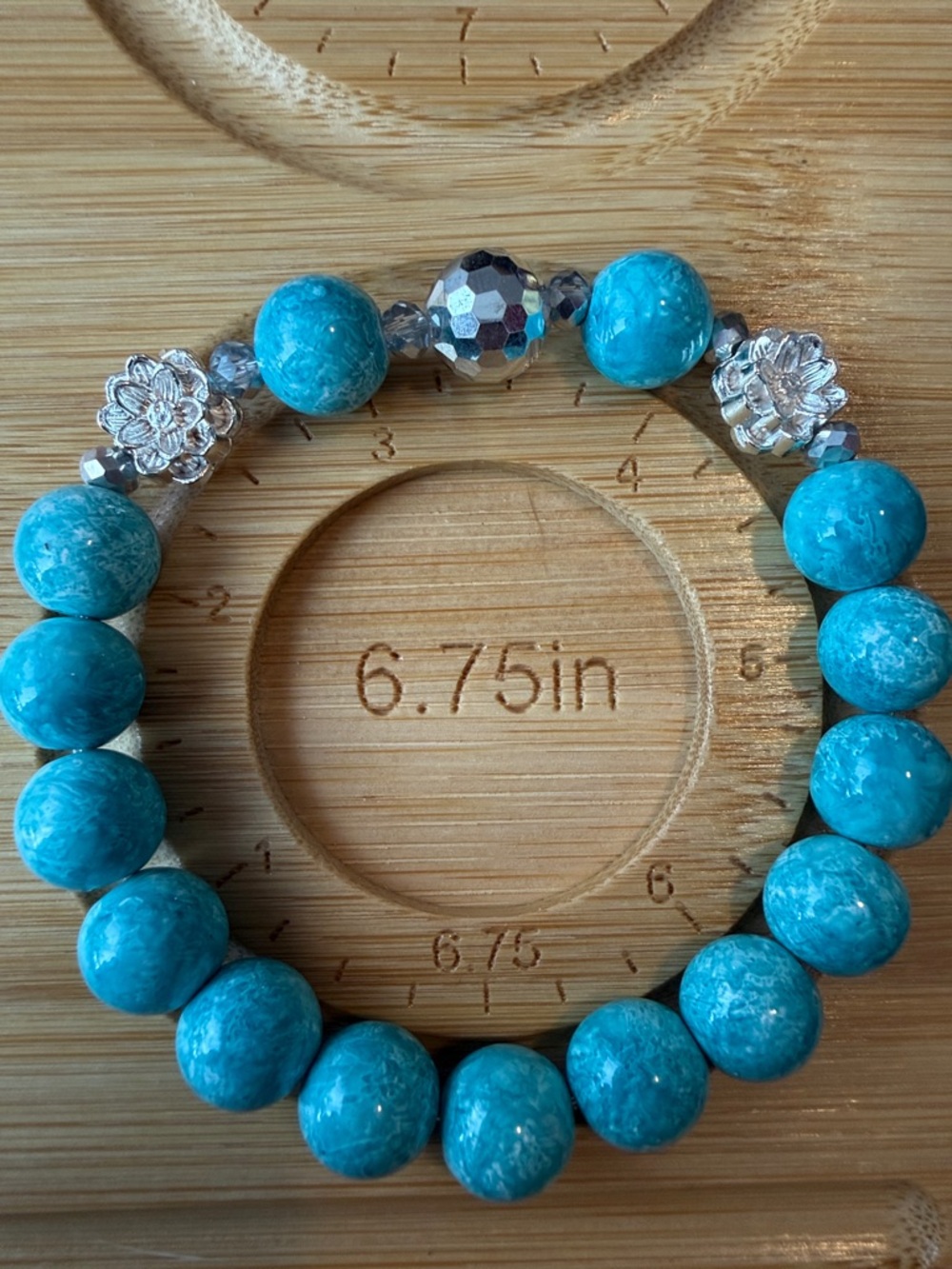 Glass Turquoise Color 10mm Beaded Stretch Bracelet with Silver Tone Accents.